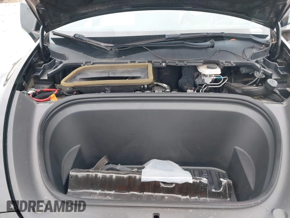 2021 Tesla Model Y Standard Range with VIN 5YJYGDED8MF123246, listed as a IAAI auction lot 41291676 with 74,630 mi miles and . Bid and sale history available at DreamBid. Image 10.