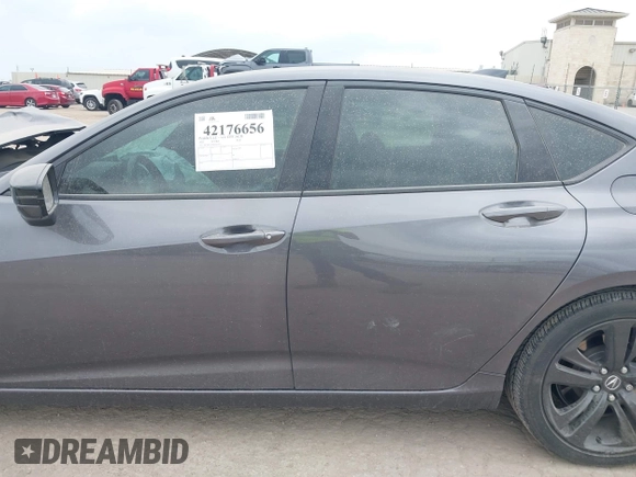 2021 Acura TLX w/A-Spec Package with VIN 19UUB5F53MA001253, listed as a IAAI auction lot 42176656 with 21,698 mi miles. Bid and sale history available at carsss.com. Image 15.