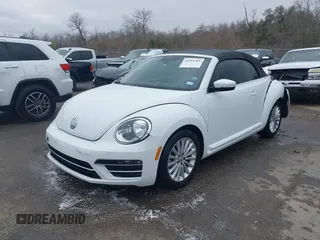 2019 Volkswagen Beetle S with VIN 3VW5DAAT4KM504847, listed as a IAAI auction lot 41582981 with 54,546 mi miles and . Bid and sale history available at DreamBid. Image 18.