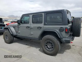 2023 Jeep Wrangler Rubicon with VIN 1C4JJXFG4PW523432, listed as a Copart auction lot 51642975 with 23,631 mi miles and Salvage title. Bid and sale history available at DreamBid. Image 2.