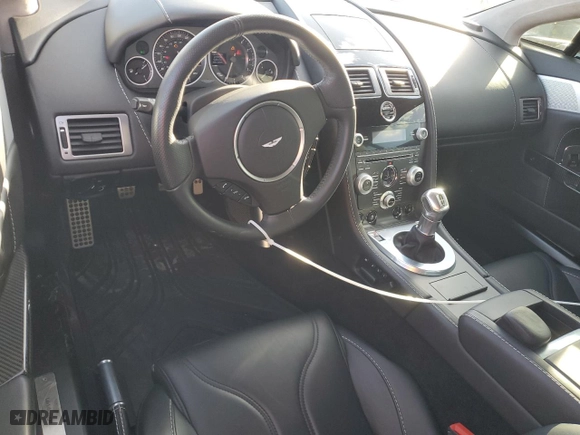 2011 Aston Martin V12 Vantage Carbon Black with VIN SCFEBBCF4BGS00791, listed as a Copart auction lot 76911374 with 8,207 mi miles and Salvage Title. Bid and sale history available at carsss.com. Image 8.