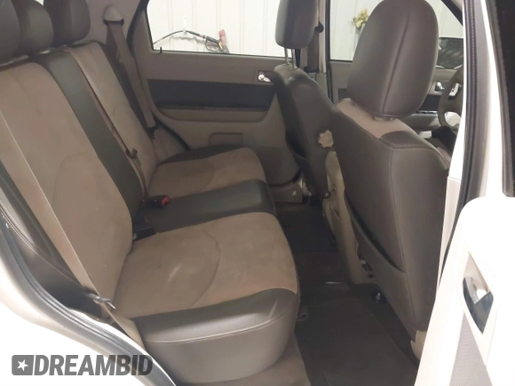 2011 Mercury Mariner Premier with VIN 4M2CN9HG3BKJ02026, listed as a IAAI auction lot 40254703 with 99,000 mi miles and . Bid and sale history available at DreamBid. Image 8.