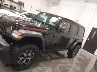 2019 Jeep Wrangler Unlimited Rubicon z VIN 1C4HJXFN7KW561193, wystawiony jako IAAI lot #41500907 z przebiegiem 18 697 mil mil oraz . Historia ofert i sprzedaży dostępna na DreamBid. Obrazek 15.
