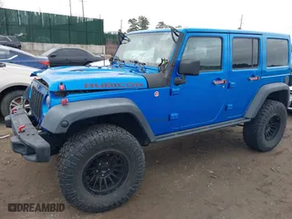 2016 Jeep Wrangler Unlimited Rubicon with VIN 1C4BJWFG2GL192074, listed as a IAAI auction lot 41598861 with 70,000 mi miles. Bid and sale history available at carsss.com. Image 2.
