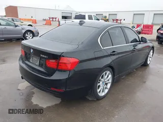 2015 BMW 3 Series 320i with VIN WBA3B1G5XFNT02032, listed as a IAAI auction lot 41581535 with 170,114 mi miles. Bid and sale history available at carsss.com. Image 4.