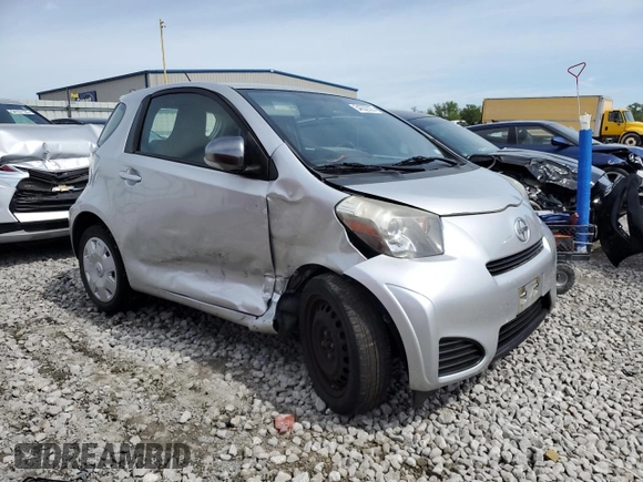 2012 Scion iQ with VIN JTNJJXB03CJ015321, listed as a Copart auction lot 54332355 with 63,439 mi miles and Salvage title. Bid and sale history available at DreamBid. Image 4.