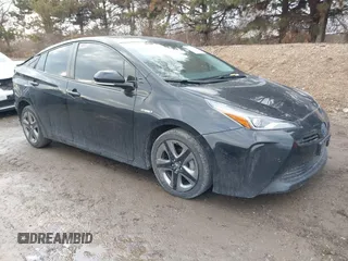 2019 Toyota Prius L Eco z VIN JTDKARFU2K3075952, wystawiony jako IAAI lot #41686956 z przebiegiem 81 000 mil mil oraz . Historia ofert i sprzedaży dostępna na DreamBid. Obrazek 1.