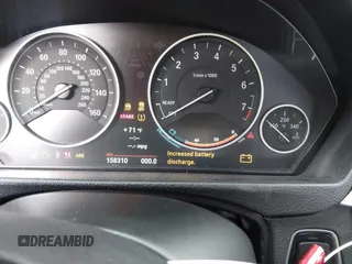 2013 BMW 3 Series 328i xDrive with VIN WBA3B3C57DF530904, listed as a IAAI auction lot 41525397 with 158,310 mi miles and . Bid and sale history available at DreamBid. Image 7.