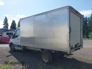 2021 Ford Transit with VIN 1FDBF6Z82MKA96495, listed as a IAAI auction lot 42410967 with 58,254 mi miles and . Bid and sale history available at DreamBid. Image 14.