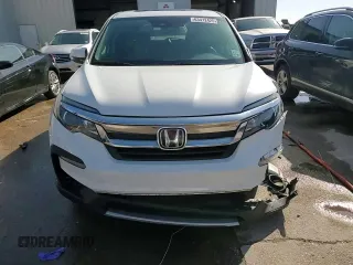2021 Honda Pilot EX-L with VIN 5FNYF5H54MB045464, listed as a Copart auction lot 63412425 with 60,666 mi miles and Salvage title. Bid and sale history available at DreamBid. Image 14.