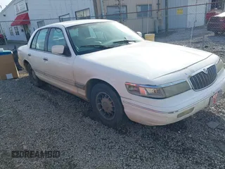 1997 Mercury Grand Marquis LS with VIN 2MELM75W5VX715872, listed as a IAAI auction lot 41612631 with 202,743 mi miles and . Bid and sale history available at DreamBid. Image 1.