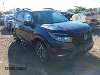 2022 Honda Passport Elite z VIN 5FNYF8H01NB003681, wystawiony jako IAAI lot #42186806 z przebiegiem 50 517 mil mil oraz . Historia ofert i sprzedaży dostępna na DreamBid. Obrazek 1.