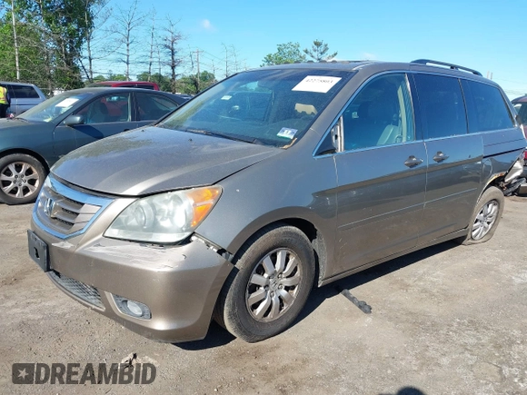 2010 Honda Odyssey EX-L с VIN 5FNRL3H68AB023411, выставлен на аукционе IAAI как лот 42275803 с пробегом 170 460 миль миль и . История ставок и продаж доступна на DreamBid. Изображение 2.