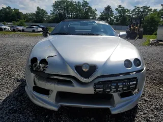 1996 Alfa Romeo Spider z VIN ZAR91600006013048, wystawiony jako Copart lot #62495174 z przebiegiem 143 888 mil mil oraz Szkody całkowita. Historia ofert i sprzedaży dostępna na DreamBid. Obrazek 5.