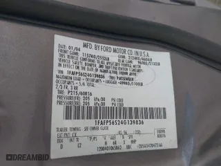 2004 Ford Taurus SEL with VIN 1FAFP56S24G139836, listed as a IAAI auction lot 41605443 with 195,778 mi miles. Bid and sale history available at carsss.com. Image 9.
