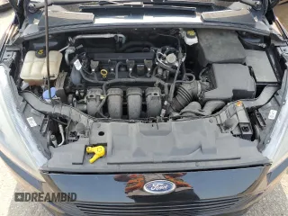 2018 Ford Focus SE z VIN 1FADP3F2XJL228407, wystawiony jako Copart lot #59254415 z przebiegiem 75 241 mil mil oraz Szkoda całkowita • Salvage title. Historia ofert i sprzedaży dostępna na DreamBid. Obrazek 11.