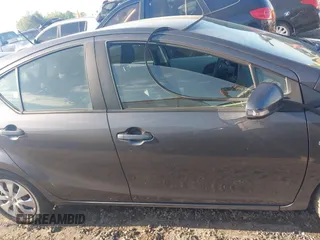 2014 Toyota Prius One with VIN JTDKDTB32E1564580, listed as a IAAI auction lot 41972541 with 186,673 mi miles and . Bid and sale history available at DreamBid. Image 13.