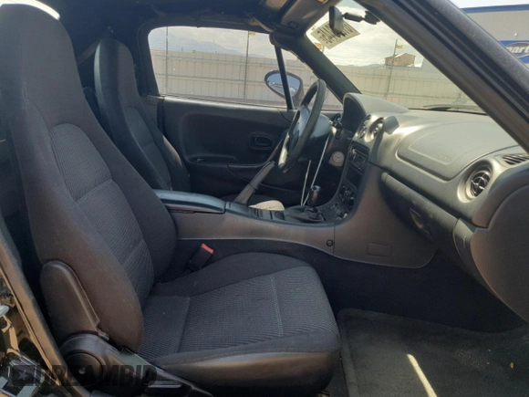 1999 Mazda MX-5 Miata with VIN JM1NB3535X0119662, listed as a Copart auction lot 61870445 with 84,787 mi miles and Clean title. Bid and sale history available at DreamBid. Image 10.