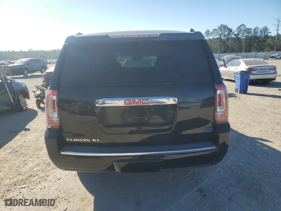 2020 GMC Yukon XL Denali with VIN 1GKS1HKJ6LR298908, listed as a Copart auction lot 85876214 with 148,958 mi miles and Salvage Title. Bid and sale history available at carsss.com. Image 6.