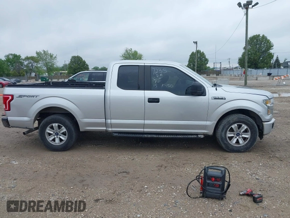 2015 Ford F-150 XL with VIN 1FTEX1C8XFKD19587, listed as a IAAI auction lot 42315673 with 220,319 mi miles and . Bid and sale history available at DreamBid. Image 13.