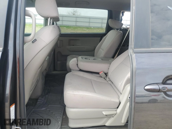 2021 Kia Sedona LX with VIN KNDMB5C17M6665266, listed as a Copart auction lot 48129495 with 57,274 mi miles and Salvage Title. Bid and sale history available at carsss.com. Image 11.