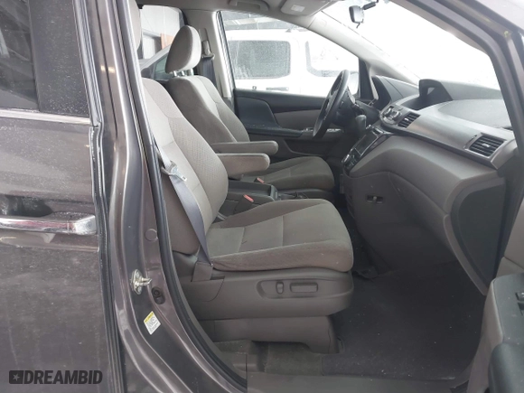 2016 Honda Odyssey SE with VIN 5FNRL5H32GB155946, listed as a IAAI auction lot 41590237 with 140,167 mi miles. Bid and sale history available at carsss.com. Image 5.