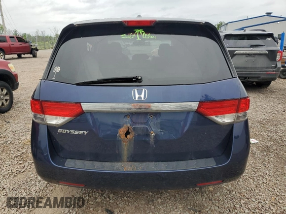 2014 Honda Odyssey EX-L with VIN 5FNRL5H61EB015958, listed as a Copart auction lot 62747765 with Not provided miles and Salvage title. Bid and sale history available at DreamBid. Image 6.