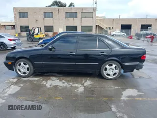 2000 Mercedes-Benz E-Class with VIN WDBJF65JXYA997410, listed as a IAAI auction lot 41939485 with 158,559 mi miles. Bid and sale history available at carsss.com. Image 15.