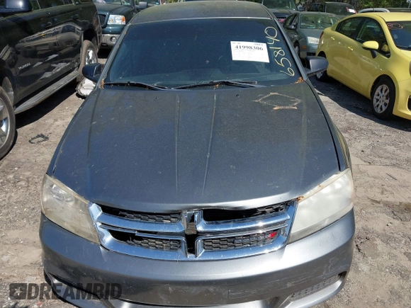 2013 Dodge Avenger SE with VIN 1C3CDZAB1DN658140, listed as a IAAI auction lot 41998306 with 215,548 mi miles. Bid and sale history available at carsss.com. Image 6.