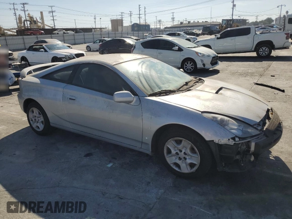 2003 Toyota Celica GT with VIN JTDDR32T130164099, listed as a Copart auction lot 77907374 with 73,950 mi miles and Salvage Title. Bid and sale history available at carsss.com. Image 4.
