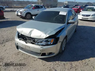 2012 Volkswagen Jetta TDI w/Premium with VIN 3VWLL7AJ0CM070228, listed as a IAAI auction lot 41709683 with Not provided miles and . Bid and sale history available at DreamBid. Image 2.