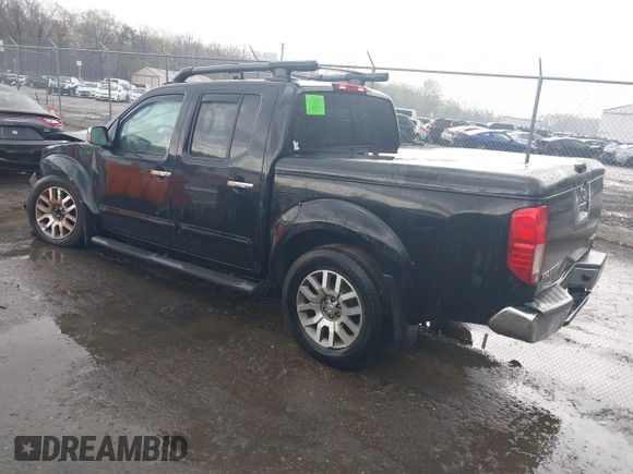 2011 Nissan Frontier Pro-4X with VIN 1N6AD0EV5BC440663, listed as a IAAI auction lot 41923918 with 168,331 mi miles and . Bid and sale history available at DreamBid. Image 3.