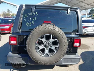 2023 Jeep Wrangler Willys with VIN 1C4HJXDN0PW597768, listed as a IAAI auction lot 41645815 with 23,717 mi miles and . Bid and sale history available at DreamBid. Image 17.