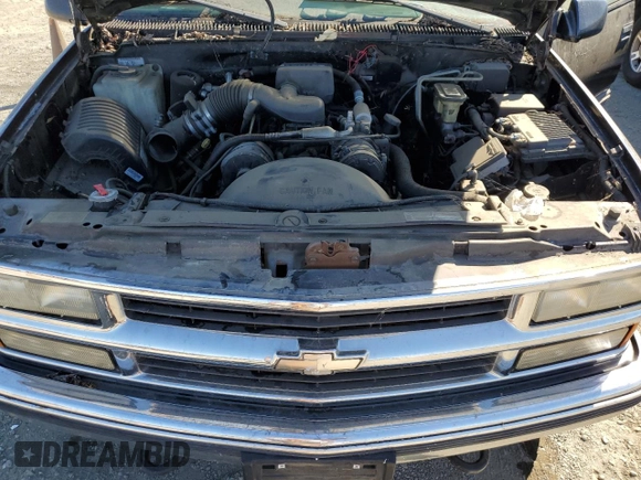 1999 Chevrolet Suburban with VIN 1GNGK26R5XJ513945, listed as a Copart auction lot 73673314 with 198,656 mi miles and Clean Title. Bid and sale history available at carsss.com. Image 12.