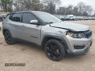 2021 Jeep Compass Altitude with VIN 3C4NJCBB1MT597509, listed as a IAAI auction lot 41800869 with 70,896 mi miles and . Bid and sale history available at DreamBid. Image 1.