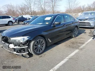 2018 BMW 5 Series 530i xDrive with VIN WBAJA7C55JWA71551, listed as a IAAI auction lot 41779459 with 155,424 mi miles. Bid and sale history available at carsss.com. Image 18.