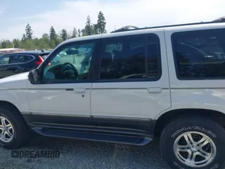 1998 Ford Explorer XL z VIN 1FMZU34E3WZA90831, wystawiony jako IAAI lot #42500120 z przebiegiem 97 799 mil mil oraz . Historia ofert i sprzedaży dostępna na DreamBid. Obrazek 13.