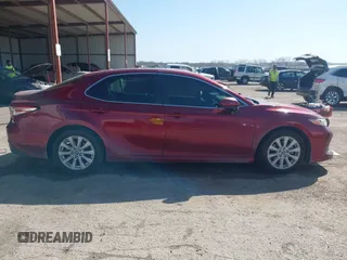 2019 Toyota Camry LE with VIN 4T1B11HK4KU725075, listed as a IAAI auction lot 41781275 with 156,856 mi miles and . Bid and sale history available at DreamBid. Image 13.