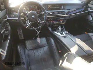 2014 BMW M5 z VIN WBSFV9C55ED593760, wystawiony jako Copart lot #49070765 z przebiegiem 128 365 mil mil oraz Tytuł czysty. Historia ofert i sprzedaży dostępna na DreamBid. Obrazek 8.
