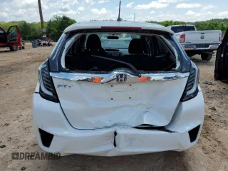 2015 Honda Fit EX-L z VIN 3HGGK5H81FM760204, wystawiony jako Copart lot #56827025 z przebiegiem 125 962 mil mil oraz Szkoda całkowita • Salvage title. Historia ofert i sprzedaży dostępna na DreamBid. Obrazek 6.