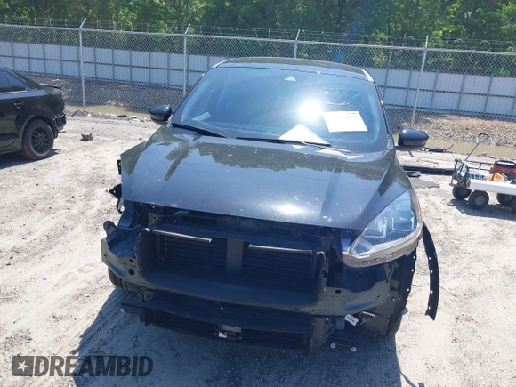 2021 Ford Escape SE z VIN 1FMCU0G66MUB26983, wystawiony jako IAAI lot #42144053 z przebiegiem 60 614 mil mil oraz . Historia ofert i sprzedaży dostępna na DreamBid. Obrazek 13.