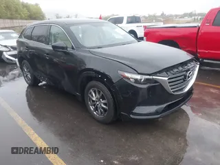 2016 Mazda CX-9 Touring with VIN JM3TCBCY5G0101490, listed as a IAAI auction lot 42062846 with 85,352 mi miles and . Bid and sale history available at DreamBid. Image 1.