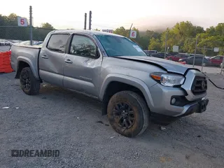 2022 Toyota Tacoma SR with VIN 3TMCZ5AN1NM519301, listed as a IAAI auction lot 42611422 with 35,889 mi miles and . Bid and sale history available at DreamBid. Image 1.