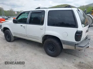 1999 Ford Explorer XLT z VIN 1FMZU34E1XZA39121, wystawiony jako IAAI lot #42107728 z przebiegiem 194 374 mil mil oraz . Historia ofert i sprzedaży dostępna na DreamBid. Obrazek 3.