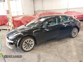 2022 Tesla Model 3 with VIN 5YJ3E1EA4NF187113, listed as a IAAI auction lot 41712331 with 81,879 mi miles and . Bid and sale history available at DreamBid. Image 25.