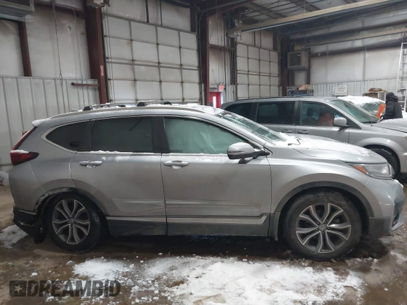 2020 Honda CR-V Touring with VIN 7FARW2H96LE000275, listed as a IAAI auction lot 41600759 with 78,078 mi miles and . Bid and sale history available at DreamBid. Image 13.