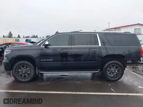 2017 Chevrolet Suburban Premier z VIN 1GNSKJKC4HR162261, wystawiony jako IAAI lot #41593672 z przebiegiem 100 136 mil mil oraz . Historia ofert i sprzedaży dostępna na DreamBid. Obrazek 15.