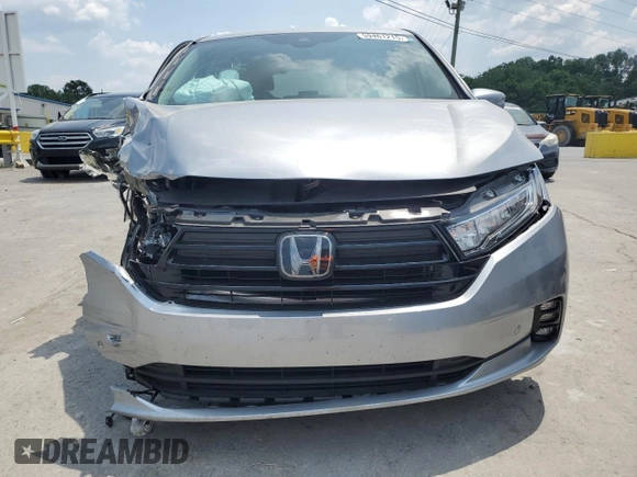 2023 Honda Odyssey Touring z VIN 5FNRL6H8XPB037385, wystawiony jako Copart lot #59461215 z przebiegiem 32 150 mil mil oraz Szkoda całkowita • Salvage title. Historia ofert i sprzedaży dostępna na DreamBid. Obrazek 5.
