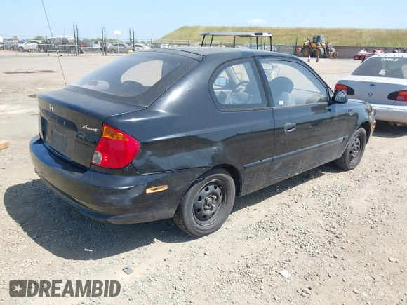 2003 Hyundai Accent with VIN KMHCF35CX3U271513, listed as a IAAI auction lot 42083235 with 166,240 mi miles. Bid and sale history available at carsss.com. Image 4.