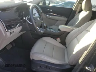 2023 Cadillac XT4 FWD Luxury z VIN 1GYAZAR42PF102696, wystawiony jako Copart lot #85540204 z przebiegiem 1 903 mil mil oraz Szkoda całkowita • Salvage title. Historia ofert i sprzedaży dostępna na DreamBid. Obrazek 7.